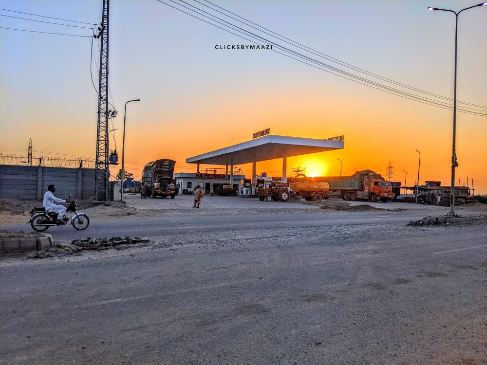 SUNSET AT THE FUEL STOP